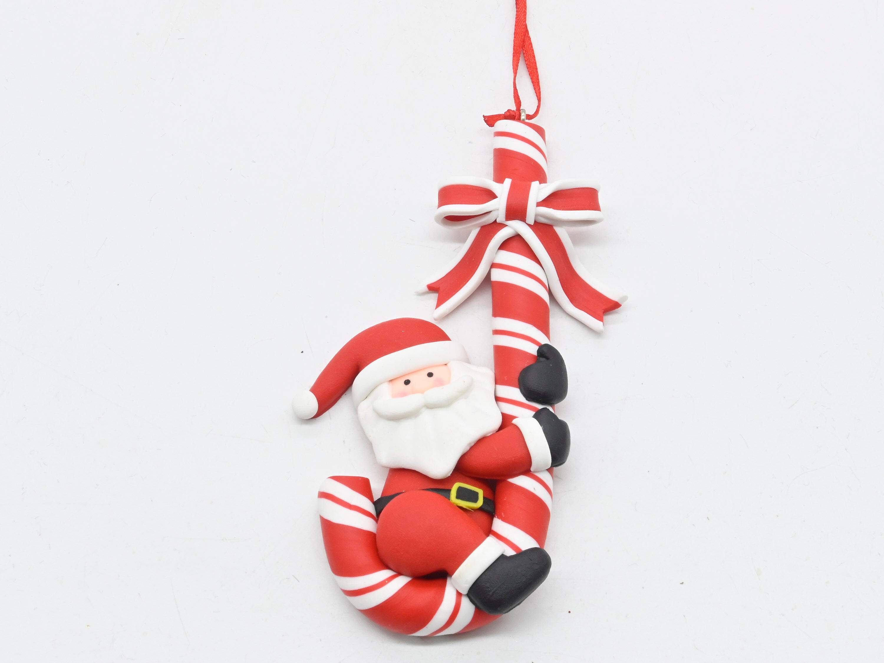 Zawieszka plastikowa laska z Mikołajem 12 x 5 x 1,5 cm - Bricomarche.pl